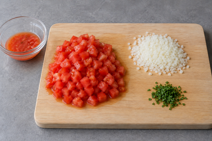 Chop the tomatoes and onion