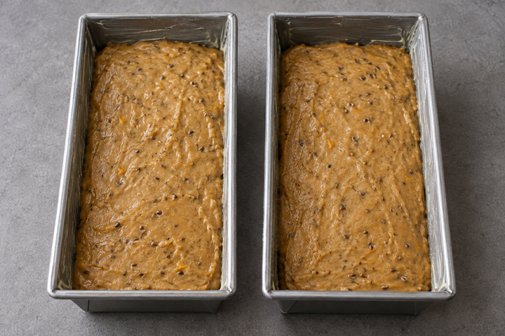Knead in the baking powder and spices; fill the pans