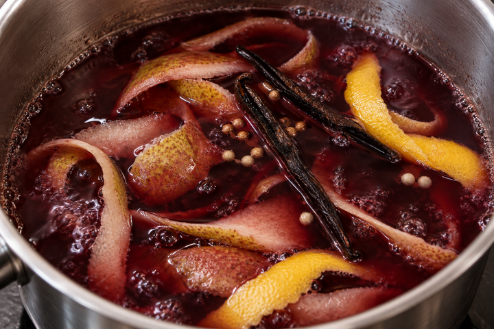 Gently simmer the red wine with the peel and aromatics for 10 minutes